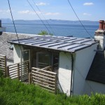 View across the new lead roof and terrace towards Skye